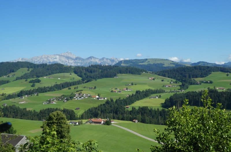 Lush green countryside in Appenzellerland, Switzerland.