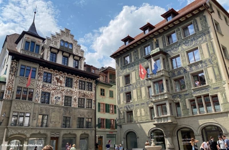 Buildings with painted facades and oriel windows in Old Town Lucerne