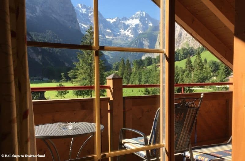 View of balcony and mountains from an apartment in Lauterbrunen