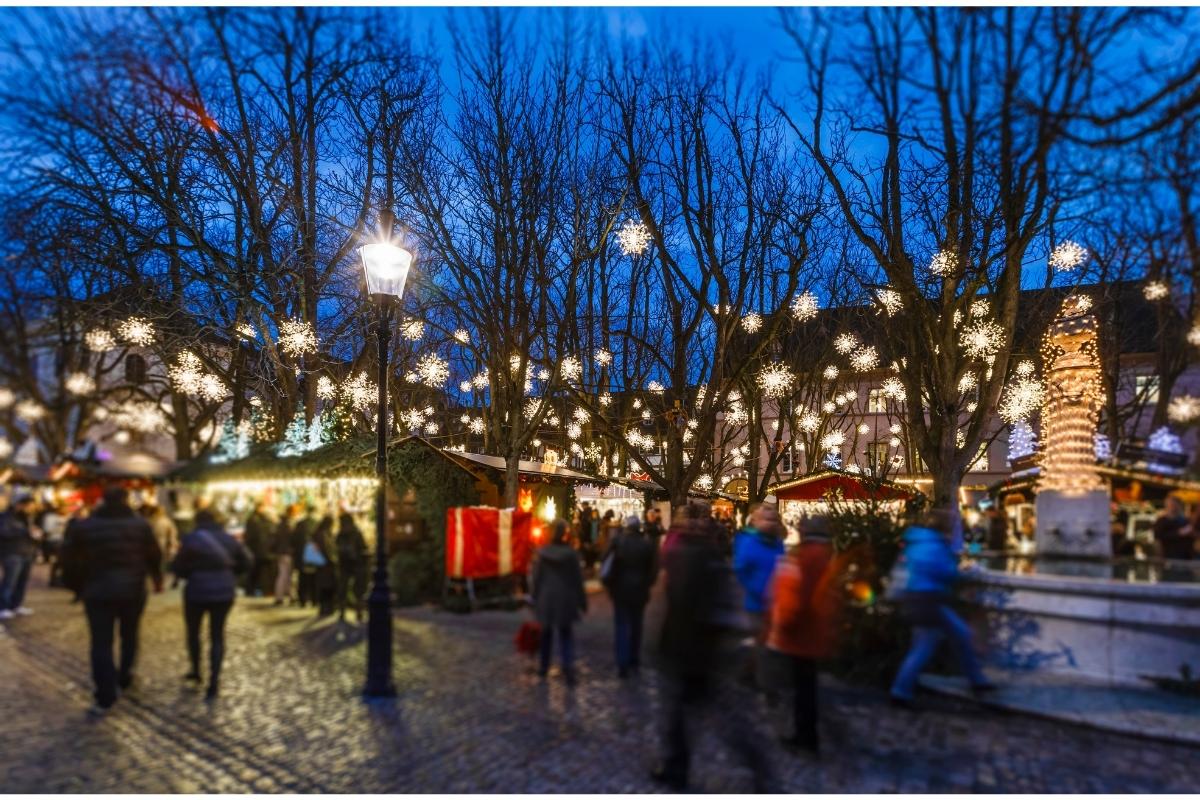 People strolling around a Christmas market in Basel, Switzerland