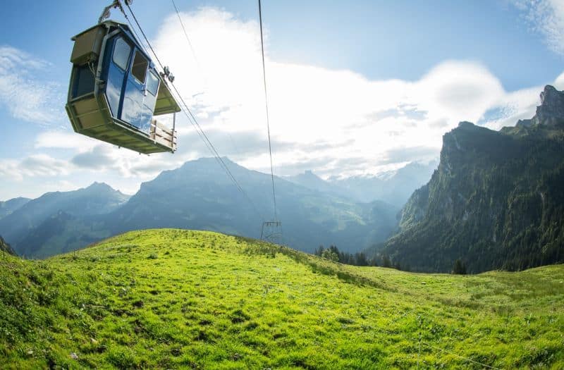 A small cable car, known as a Buirabahnli, near Engelberg in Switzerland