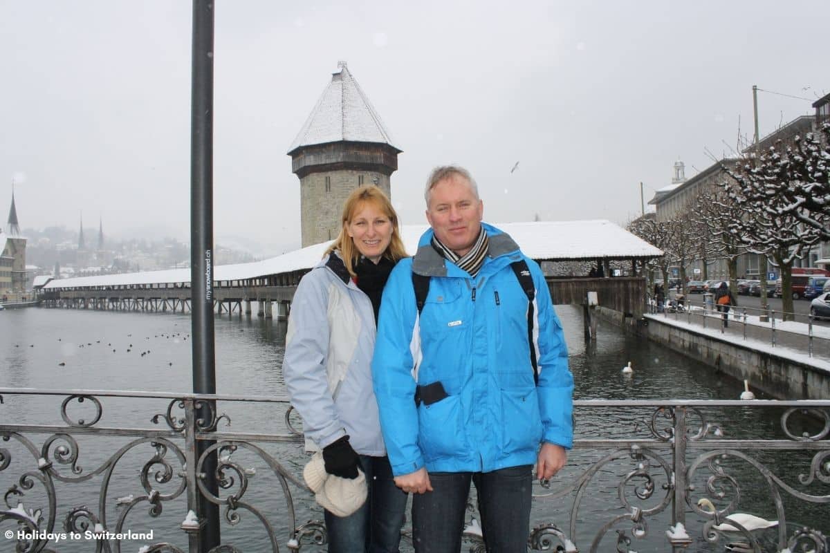 Carolyn and Jurgen at Chapel Bridge in Lucerne during winter