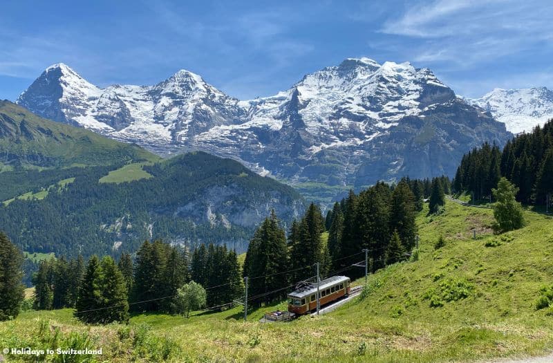 Train with Eiger Monch and Jungfrau backdrop