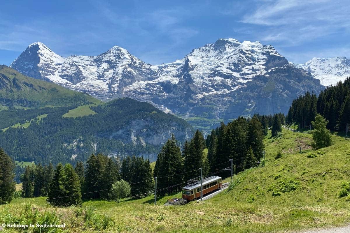 Train with Eiger Monch and Jungfrau backdrop