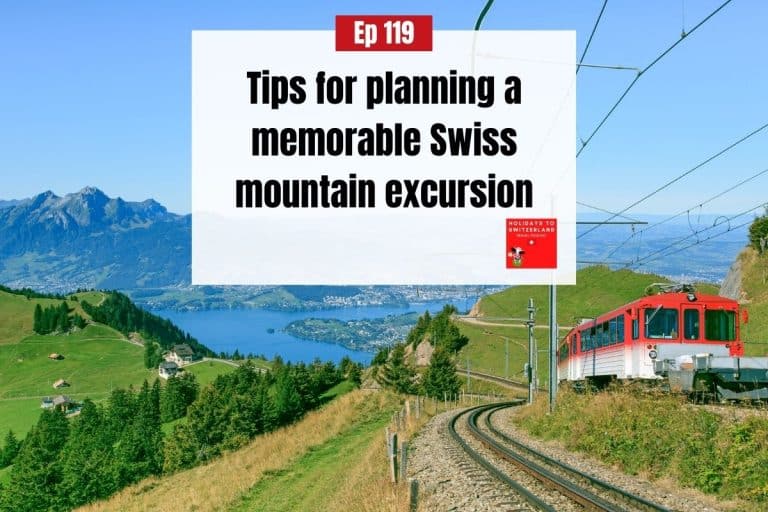 Red and white cogwheel train on Mt Rigi with Lake Lucerne in the distance