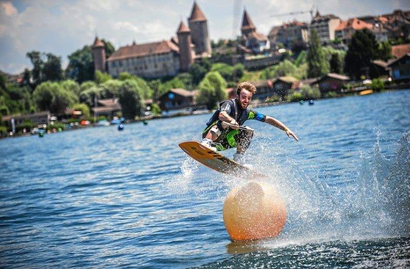 Man wake boarding on Lake Neuchatel in Switzerland