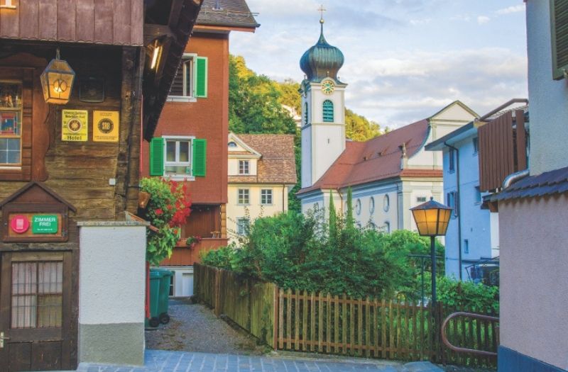 Historic house and church in Gersau Switzerland