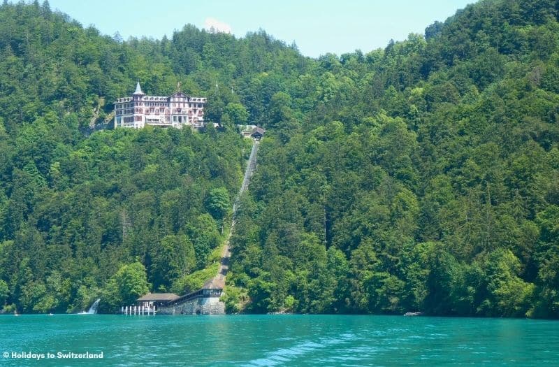 Grandhotel Giessbach sits above Lake Brienz and can be reached by a funicular from the lake front.