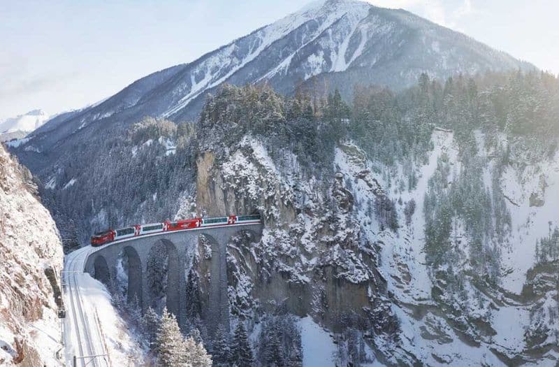 Glacier Express crossing the Landwasser Viaduct in winter