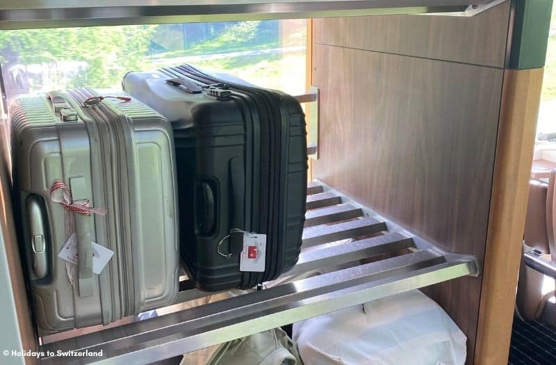 Suitcases stored in the luggage rack onboard the Glacier Express train in Switzerland