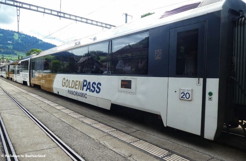 GoldenPass Panoramic train at Saanen station in Switzerland