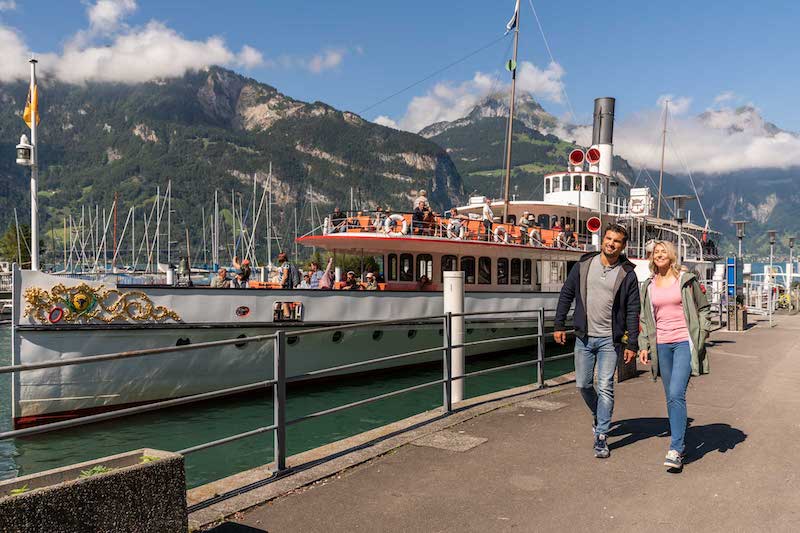 Couple beside boat pier in Fluelen.