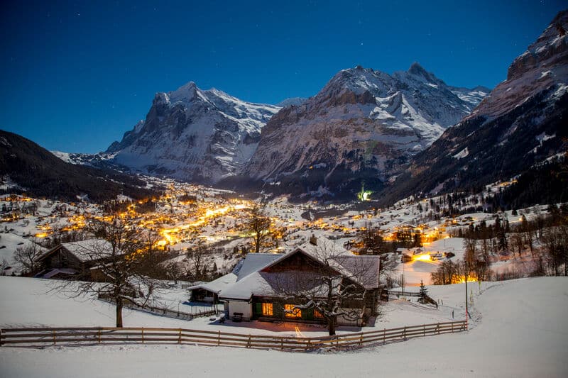 The village of Grindelwald with the Swiss mountains of Wetterhorn and Eiger.