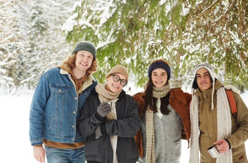 Group of young people dressed warmly in winter