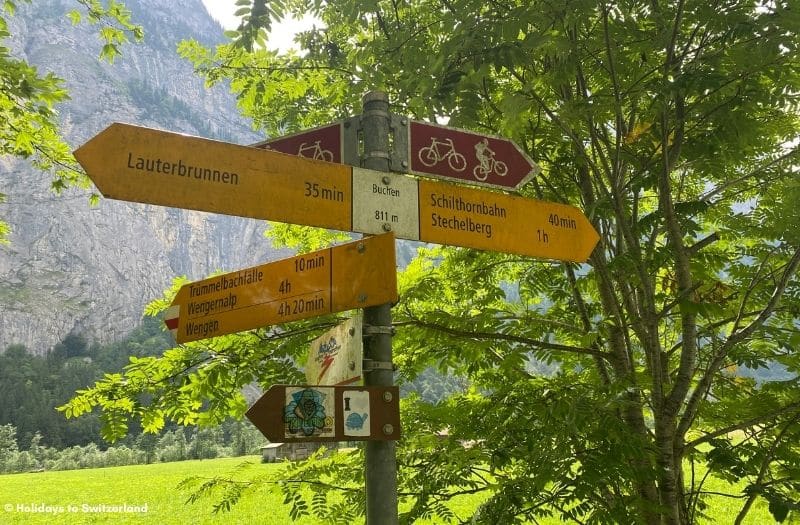 Hiking trail signs near Lauterbrunnen in Switzerland