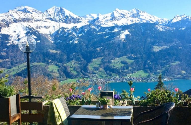 Hotel Gloria Beatenberg's restaurant terrace with mountain and lake views