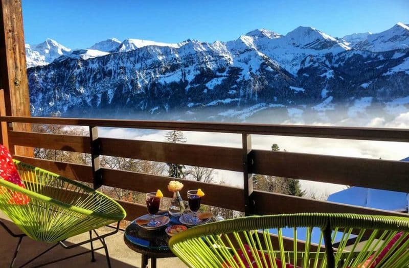 Stunning mountain views from a balcony at Hotel Gloria in Switzerland. The hotel is located in Beatenberg near Interlaken.