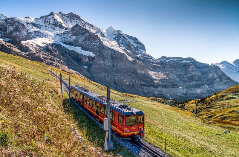 Jungfrau Railways train with a mountain backdrop