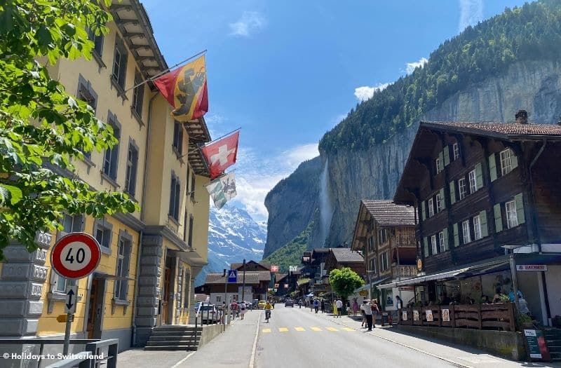 Lauterbrunnen main street with Staubbach Falls view.