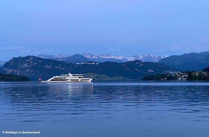 The ship MS Diamant sailing on Lake Lucerne in the evening.