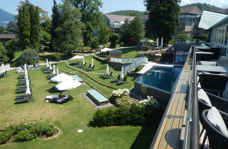 Pool and garden area at Belvedere Strandhotel in Spiez Switzerland