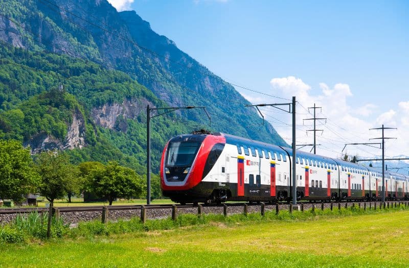 SBB train passing through countryside in Switzerland