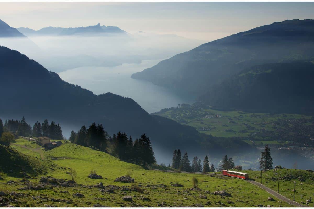 Schynige Platte cogwheel train with view to Lake Thun