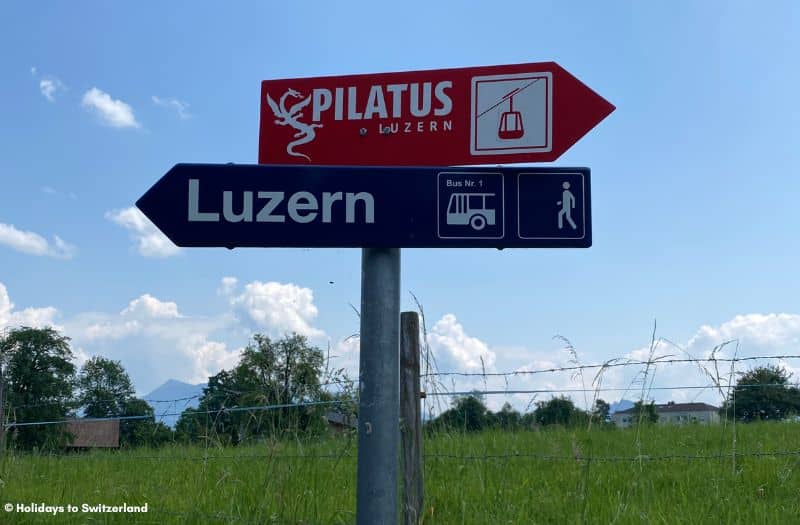 Signs directing the way to Mt Pilatus cable car in Kriens