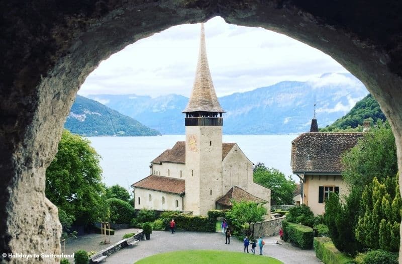 Spiez Castle Church in front of Lake Thun