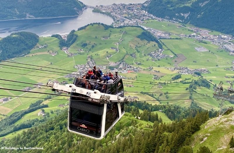 Mt. Stanserhorn's CabriO cable car with views over Lake Lucerne