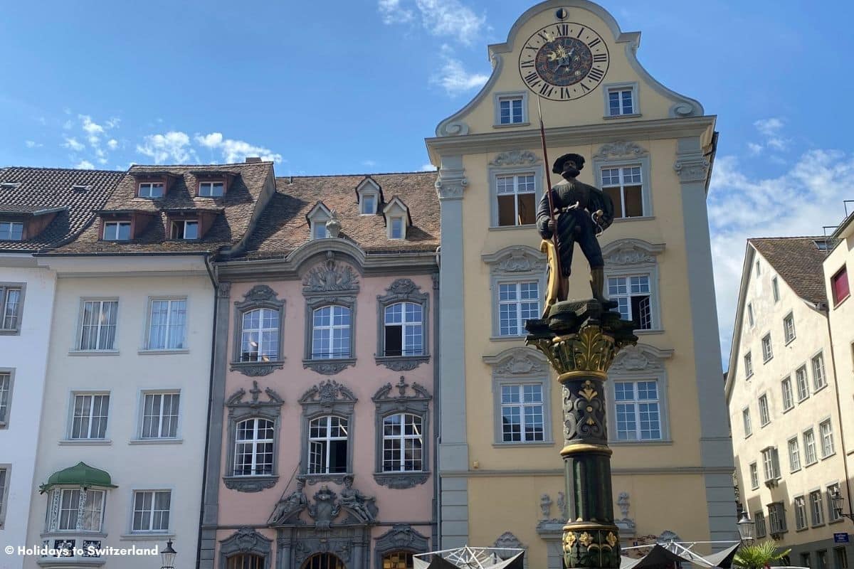 Statue and clock in Schaffhausen Old Town