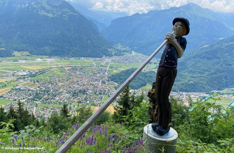 Wooden statue at Harder Kulm overlooking Interlaken and the Lauterbrunnen Valley.