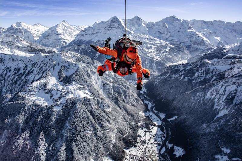 Helicopter skydiving above the Swiss Alps