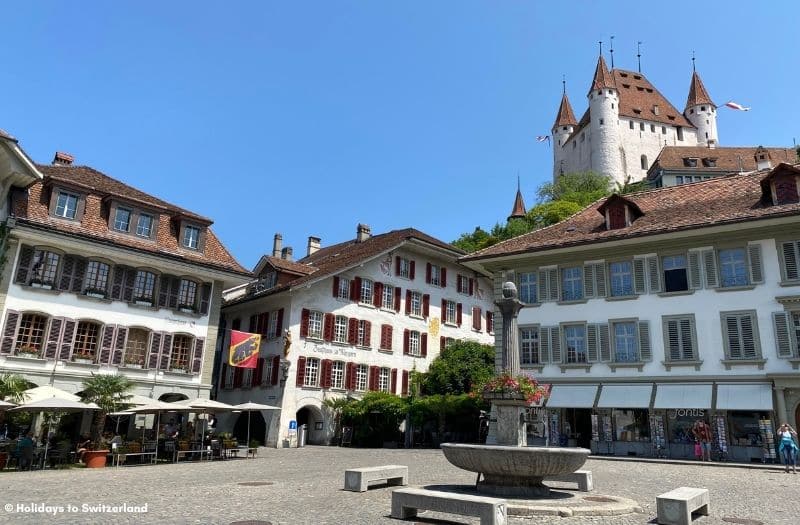 Thun Castle looking over a square in the Old Town