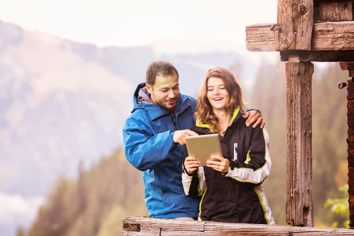 tourist in Switzerland using a tablet