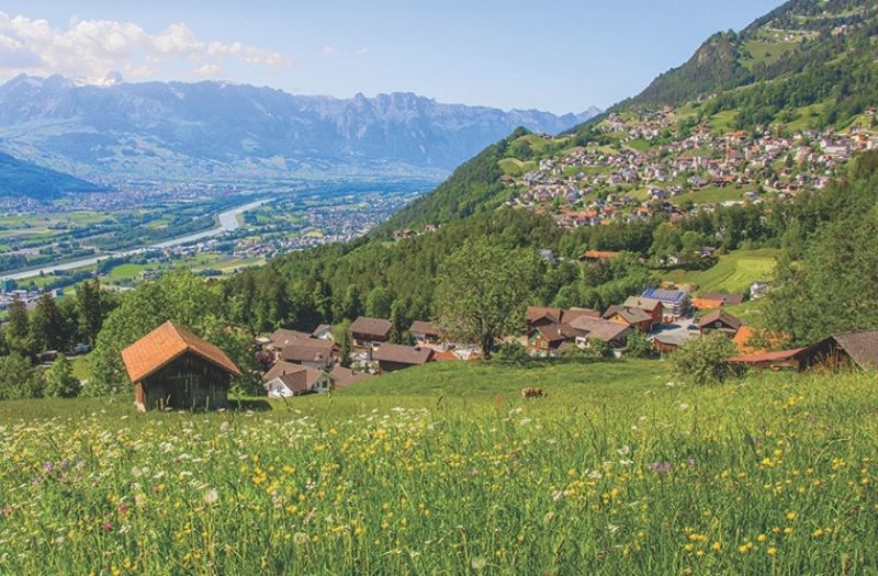 Aerial view over Triesenberg, Liechtenstein and the Rhine River