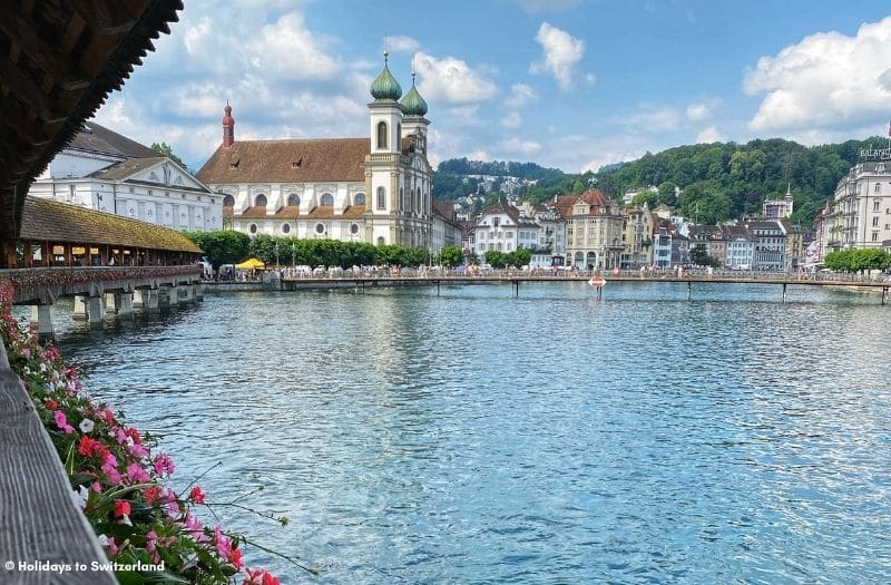 View of Jesuit Church from Chapel Bridge in Lucerne