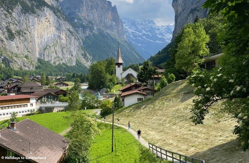 A pathway provides a scenic route to Lauterbrunnen's church