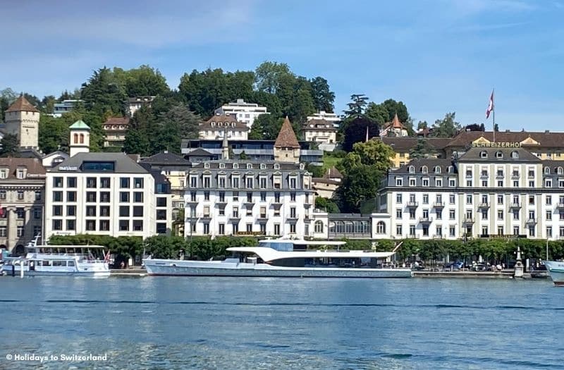 A yacht moored near the Hotel Schweizerhof beside Lake Lucerne